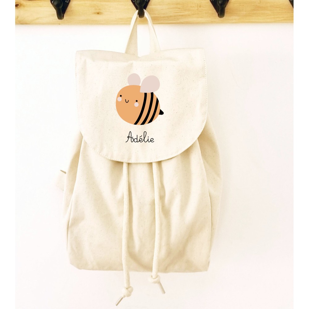Sac à dos écru personnalisé en coton bio pour enfant motif abeille– Sweet Chic Accessoires